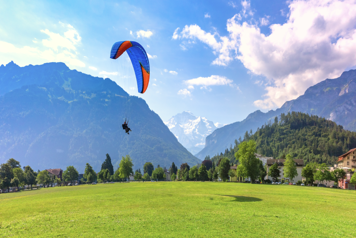 A paraglider preparing to land in Garmisch, Germany